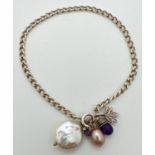 A 925 silver 7.5 inch curb chain bracelet with pearls, amethyst and leaf charms and spring ring