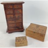 A small wooden 8 drawer chest with metal ring handles, together with a cigar box and one other.