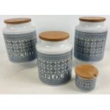 4 vintage ceramic storage jars with wooden lids, by Hornsea, in 'Tapestry' design. Each stamped to