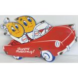 An enamel advertising wall sign of the Esso oil drop boy & girl driving a car. Approx. 50cm long x