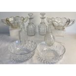 4 vintage glass decanters together with 4 large glass bowls. Includes 2 large 2 handled