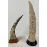 2 vintage carved faux horn ornaments. A large cream coloured resin horn, fully carved with flora &