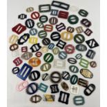 A collection of 75 vintage buckles, mostly early plastic. In varying colours, sizes and designs to