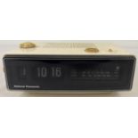 A vintage National Panasonic AM/FM radio alarm clock model no. RC-6030 BE, same as the one