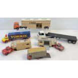 A collection go vintage diecast lorries and animal transporters. To include a horse/cattle box by
