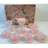 A vintage pale pink marble effect early plastic 21 piece teaset by projects. Comprising: 6 cups