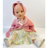 A vintage c1940's 24" composition baby doll by Frank Popper, with cry box. Needs attention. With