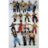 A collection of 16 assorted WWE & WCW wrestling figures by Jakks and Toy Biz, from the late 1990's
