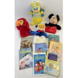 A collection of assorted toys and ladybird books. To include Playskool Glow Worm and Disney