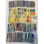 106 assorted Pokemon cards together with 185 ultra beast cards.