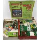 A boxed 1970's Subbuteo table soccer World Cup edition. With playing pitch, flood lights, score