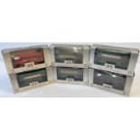 6 boxed 00 scale diecast buses with advertising decals by Exclusive First Editions. To include