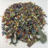 A large collection of assorted vintage miniature 1/72 scale toy soldiers, Cowboys & Indians and