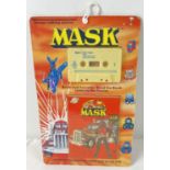 A Tempo Talking Toys Mask book and cassette from Kenner Parker Toys, 1986. In original card and