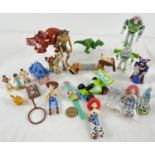 A box of assorted Disney toys & figures to include Macdonalds toys. Lot includes: Toy Story, Tarzan,