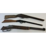 3 vintage 1950's toy air rifles with wooden handles. One marked 'Replicas by Parris, Savannah,
