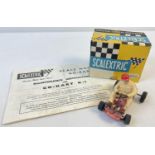 A boxed 1960's Tri-ang Scalextric Electric Model Racing K/1 Go-Kart in red. Together with original