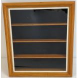 A glass fronted wall hanging display cabinet suitable for model cars and vehicles with 3 interior