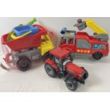 A modern battery operated fire truck by carousel. Together with a brand new plastic tipper truck