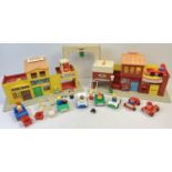 A vintage Fisher Price Family Play Village play set with accessories. To include cars, figures and