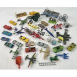 A box of assorted vintage mixed diecast vehicles and aeroplanes, in play worn condition. To