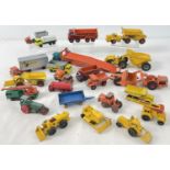 A collection of vintage Matchbox construction vehicles, lorries and trucks. In play worn