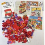 A small collection of assorted Lego pieces together with assorted Lego booklets & instruction