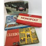 4 vintage 1960's & 70's boxed Waddington's board games - Formula 1, Railroader, Monopoly and Cluedo.