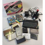A vintage Sinclair ZX Spectrum 48K personal computer and accessories. Complete with ZX power supply,