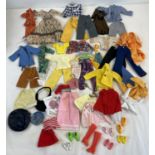 A collection of vintage, modern and handmade Sindy dolls clothes and footwear. To include