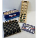 3 traditional games. Boxed Mancala game complete with glass pieces, a wooden chess set and a boxed