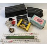 A 1960's unboxed Tri-ang Scalextric racing car set with 2 1961 Lotus racings cars in yellow and
