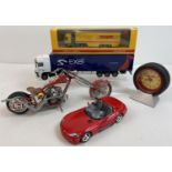 A collection of diecast vehicles to include boxed DHL lorry, red Dodge Viper by Burago and a Joyride