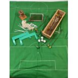 A collection of Subbuteo goal keepers on wires and assorted accessories. To include green felt
