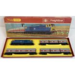 A boxed vintage Triang Hornby Freightliner Locomotive D7063 and wagons set R645. Box torn on one