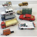 A collection of vintage diecast toy cars and vehicles by Corgi and Dinky, in play worn condition. To