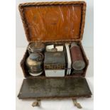 An early 20th century Drew & Sons 'En Route' picnic hamper for 4, circa 1910. With leather straps
