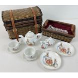 A 1990's Reutter porcelain The World of Beatrix Potter Peter Rabbit tea for 2 set in dome topped