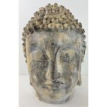 A large weathered concrete effect resin ornamental Buddha head. Approx. 45cm tall.