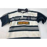 A 1990's Newcastle Falcons No 10 Rugby shirt, worn by and signed by Fly half Rob Andrew. Size XL.