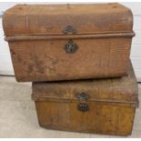 2 vintage tin trunks. Both with carry handles and stud detail to top. Front catch to both a/f.