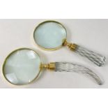 2 large magnifying glasses with faceted glass handles. Glass diameters approx. 10cm.