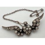A vintage 900 silver sweetheart stone set pin back brooch with safety chain. Pin is missing from