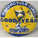 A circular shaped convex enamelled wall sign for Goodyear motorcycle tyres. Approx. 29.5cm diameter.