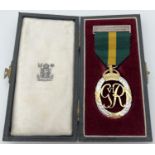 A 1950 Territorial Army Efficiency Decoration medal with award letter, bar, ribbon and original