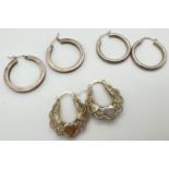 3 pairs of silver hoop style earrings. 2 pairs of plain hoops together with a pair of pierced work