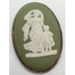 A vintage large oval shaped green Wedgwood brooch in silver rope design mount. Hallmarked London