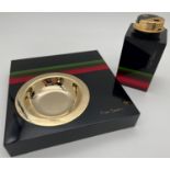 A 1970's black and rainbow stripe Lucite smoking set by Pierre Cardin. Block lighter with gold