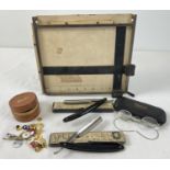 A collection of assorted vintage items to include 2 boxed cut-throat razors. Lot also includes