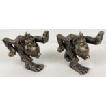 A pair of bronzed effect cast iron bookends in the form of orangutans. Each approx. 14.5cm tall